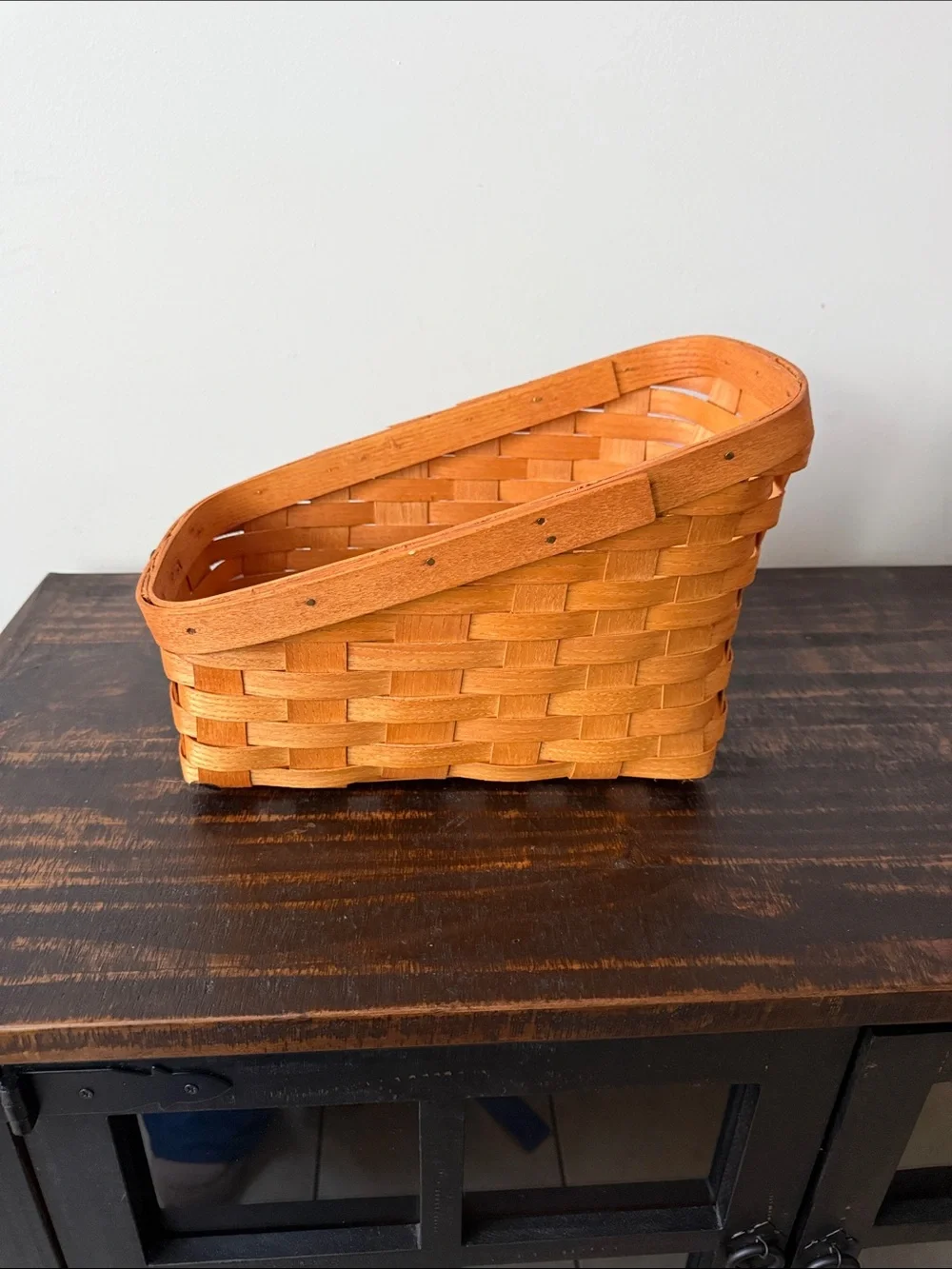Handwoven Orange Storage Basket with Metal Badge